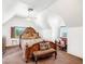 Bedroom featuring an ornate bed frame and a cozy seating area at 912 Santa Ynez Ave, Henderson, NV 89002