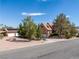 Charming Tudor-style home with well-maintained landscaping and spacious driveway at 912 Santa Ynez Ave, Henderson, NV 89002