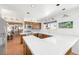 Bright kitchen featuring white tile countertops, wood cabinets, and stainless steel appliances at 912 Santa Ynez Ave, Henderson, NV 89002