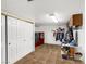 Well-organized laundry room with washer, dryer, storage cabinets, and ample counter space at 912 Santa Ynez Ave, Henderson, NV 89002