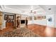 Spacious entertainment room boasts a brick fireplace and stylish decor at 912 Santa Ynez Ave, Henderson, NV 89002