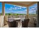 Balcony featuring patio furniture and offering scenic views of the surrounding landscape at 1000 E Sunset Rd, Henderson, NV 89011