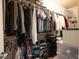 Walk-in closet with clothing, shelves, and luggage storage solutions at 1000 E Sunset Rd, Henderson, NV 89011