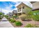 Charming street view of a well-maintained residential area, highlighting lush desert landscaping at 1000 E Sunset Rd, Henderson, NV 89011