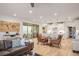 Open floor plan featuring plank floors seamlessly connecting living, dining, and kitchen areas at 1000 E Sunset Rd, Henderson, NV 89011