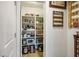 Walk-in pantry with shelving stocked with storage containers, appliances and food items at 1000 E Sunset Rd, Henderson, NV 89011