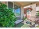 Comfortable porch with plants and bench seating; ideal for relaxing at 1000 E Sunset Rd, Henderson, NV 89011