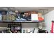 Garage interior with overhead rack featuring ample storage space at 1000 E Sunset Rd, Henderson, NV 89011