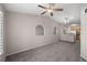 Living room with plush carpet and a ceiling fan at 10001 Peace Way # 2228, Las Vegas, NV 89147