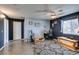 Spacious bedroom with ample space for desk, storage, and a comfortable living area at 1048 Painted Daisy Ave, Henderson, NV 89074