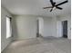 Bonus room featuring neutral carpet and doorway access to the staircase at 1048 Painted Daisy Ave, Henderson, NV 89074