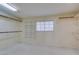 Spacious walk-in closet with carpeted floors, wire shelving, and a window at 1048 Painted Daisy Ave, Henderson, NV 89074