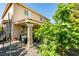 Charming two-story house featuring a covered patio and beautiful landscaping at 1048 Painted Daisy Ave, Henderson, NV 89074
