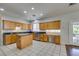 Modern kitchen with stainless appliances, granite countertops and ample lighting at 1048 Painted Daisy Ave, Henderson, NV 89074