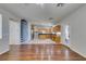 Hardwood floors accent the living room and kitchen with a center island at 1048 Painted Daisy Ave, Henderson, NV 89074