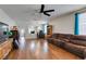 Expansive living room showcases wood floors and ample seating at 1048 Painted Daisy Ave, Henderson, NV 89074