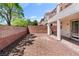 Low maintenance backyard featuring gravel and a brick wall for privacy at 10713 Noble Mesa Ave, Las Vegas, NV 89166