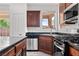 Functional kitchen featuring stainless steel appliances, granite countertops, and ample storage space at 10713 Noble Mesa Ave, Las Vegas, NV 89166