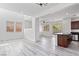 Bright living room with hardwood floors, neutral walls, and lots of natural light at 10713 Noble Mesa Ave, Las Vegas, NV 89166