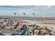Wide aerial shot of the neighborhood, pinpointing the home's location at 1125 Via Canale Drive and nearby landmarks at 1125 Via Canale Dr, Henderson, NV 89011