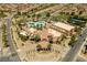 Overhead view of the community center featuring pools, tennis courts, and recreational facilities at 1125 Via Canale Dr, Henderson, NV 89011