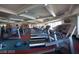 A modern gym equipped with treadmills and various fitness machines for a complete workout at 1125 Via Canale Dr, Henderson, NV 89011