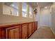 Hallway features built-in storage cabinets. Interior of home at 1125 Via Canale Dr, Henderson, NV 89011