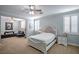 The main bedroom with neutral tones has ample space and natural light at 1125 Via Canale Dr, Henderson, NV 89011