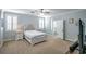 The main bedroom with neutral tones boasts an ensuite bathroom at 1125 Via Canale Dr, Henderson, NV 89011