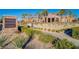 Tuscany Recreation Center with lush landscaping, a welcoming sign, and an inviting exterior at 1125 Via Canale Dr, Henderson, NV 89011