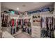 Spacious walk-in closet with ample shelving and hanging space for organized storage solutions at 1125 Via Canale Dr, Henderson, NV 89011