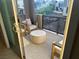 Charming balcony space with comfortable seating and a view of the neighborhood at 11257 Rainbow Peak Ave # 201, Las Vegas, NV 89135