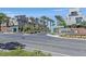 Attractive community entrance with lush landscaping and contemporary signage at 11257 Rainbow Peak Ave # 201, Las Vegas, NV 89135