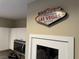 Kitchen detail with welcome to Las Vegas sign and stainless steel microwave appliance at 11257 Rainbow Peak Ave # 201, Las Vegas, NV 89135