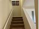 Carpeted staircase leading to the upper level of the home at 11257 Rainbow Peak Ave # 201, Las Vegas, NV 89135