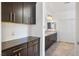 Bathroom vanity with granite countertops, dual sinks, and ample storage space at 12254 Cape Cortez Ct, Las Vegas, NV 89138