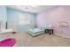 Comfortable bedroom featuring a single bed, dresser, and a modern ceiling fan at 12254 Cape Cortez Ct, Las Vegas, NV 89138