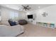 Bright living room features neutral tones, comfortable seating, and built-in shelving at 12254 Cape Cortez Ct, Las Vegas, NV 89138