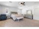 Stylish main bedroom featuring plush bedding, elegant furniture, and ample natural light at 12254 Cape Cortez Ct, Las Vegas, NV 89138