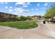 A lush green community park offers walking paths and inviting spaces for relaxation and recreation at 12254 Cape Cortez Ct, Las Vegas, NV 89138
