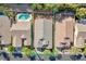Aerial view showcasing a well-maintained home with a private backyard and refreshing pool at 129 Sapodilla Ln, Las Vegas, NV 89144