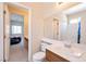 Bright bathroom with a shower-tub combo and a single sink vanity at 129 Sapodilla Ln, Las Vegas, NV 89144
