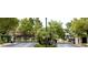 Beautiful Belvedere community entrance with gated entry and lush landscaping at 129 Sapodilla Ln, Las Vegas, NV 89144