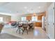 Bright and open kitchen with a center island, breakfast bar and an adjacent dining area at 129 Sapodilla Ln, Las Vegas, NV 89144