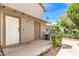 Townhouse with private front entrance, covered porch, and manicured landscaping at 1508 Dorothy Ave # 4, Las Vegas, NV 89119