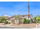 Two-story home featuring tidy landscaping and a distinctive desert tree at 1508 Dorothy Ave # 4, Las Vegas, NV 89119