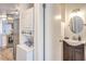 A stacked washer and dryer is conveniently located by the bathroom and kitchen at 1508 Dorothy Ave # 4, Las Vegas, NV 89119