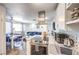 Open floor plan with an updated kitchen, living room and dining area, creating an inviting and functional space at 1508 Dorothy Ave # 4, Las Vegas, NV 89119