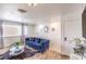 Cozy living space with a stylish blue sofa and modern decor at 1508 Dorothy Ave # 4, Las Vegas, NV 89119