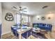 Cozy living space with dining area, blue sofa and modern decor at 1508 Dorothy Ave # 4, Las Vegas, NV 89119